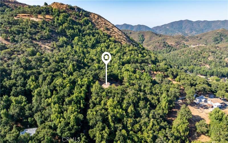 The home is tucked into the hillside and possesses a sense of escape.