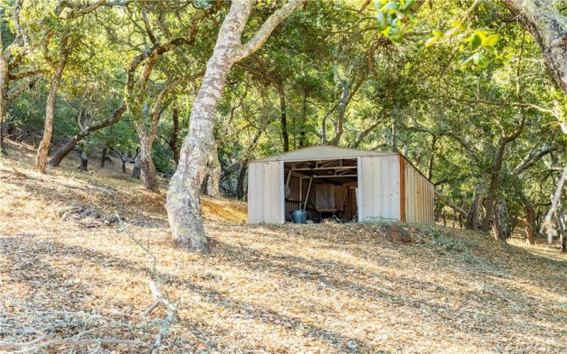 There is a shed for additional storage.