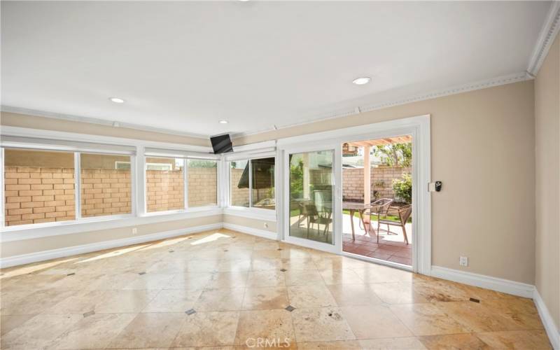 Backyard views from the family room and kitchen areas.