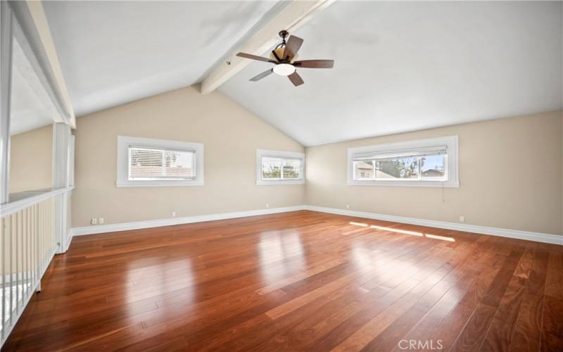 Vaulted ceilings and recess lighting upstairs.