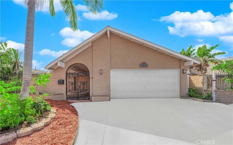 2 car garage with plenty of built in storage and full size laundry units.