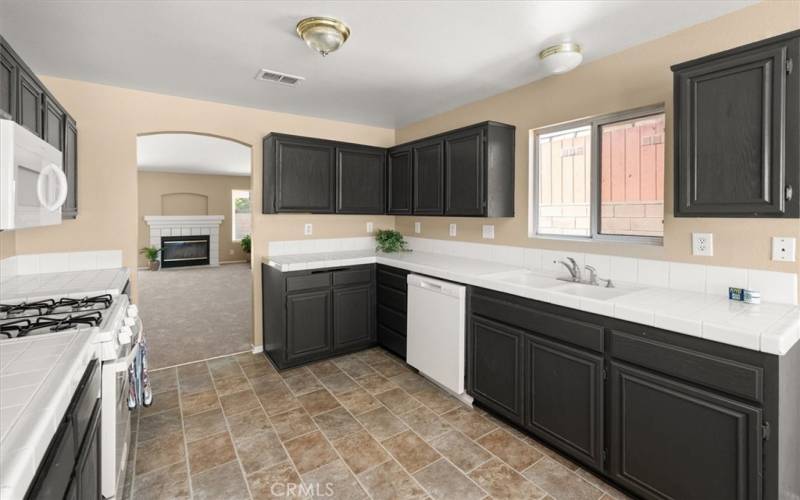 Kitchen flows into Dining Room & Living Room