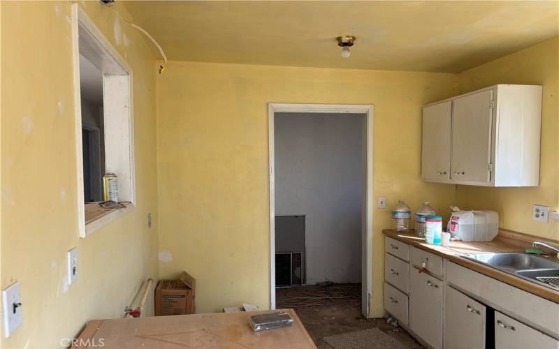 Kitchen, and door to laundry room.