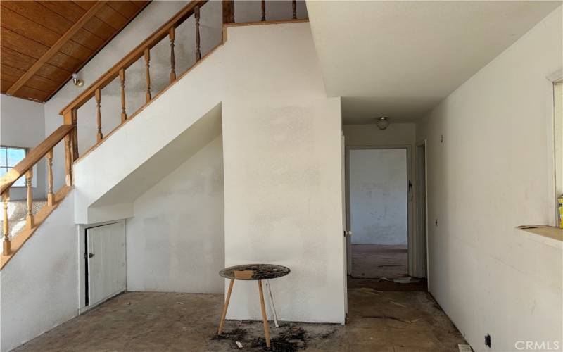 Living room and hallway to bedrooms and bathroom.