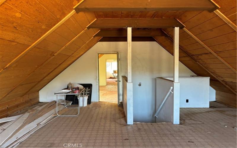 Upstairs bonus room with stairway to garage.