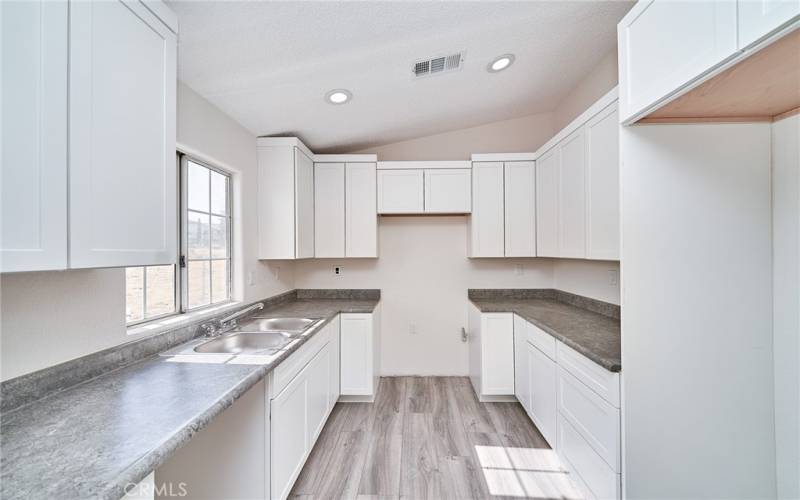 Remodeled Kitchen with new counter tops and cabinets.