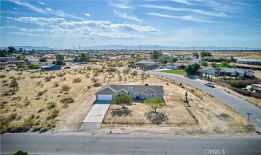 Front aerial view of corner lot #1