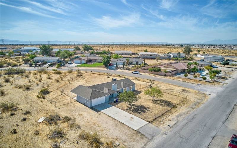 Front left aerial view of corner lot.