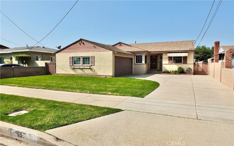 Driveway leads to2-car garage