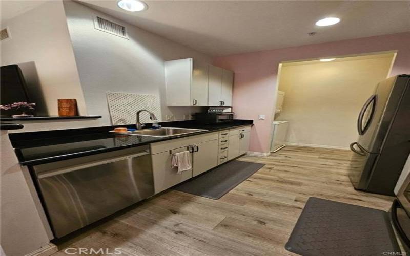 Kitchen, wall has been painted gray