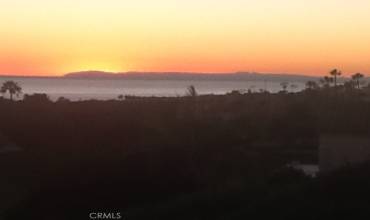 Sunset view from interior and exterior of home.