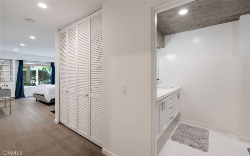 View into Primary Bath, Closet and Bedroom