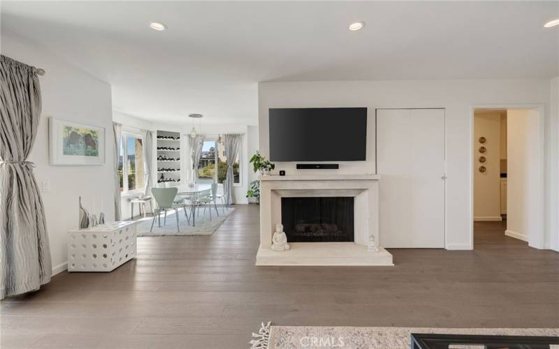 Warm Wood floors and an open floor plan