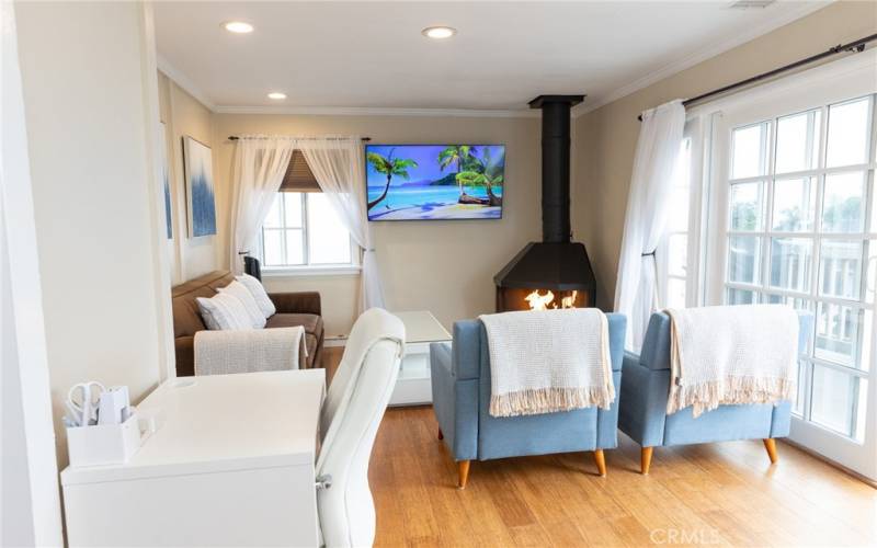 Entry into the unit. Gas Fireplace in Living Room with ocean views.