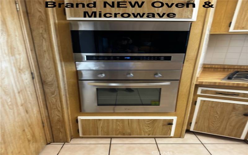 NEW MICROWAVE AND OVEN.