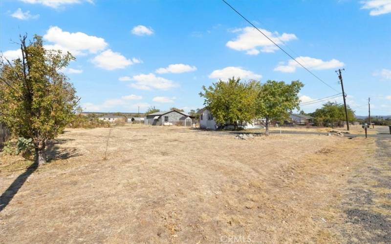 Vacant lot next door with separate APN