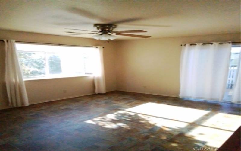 Dining room with garden window and door to patio