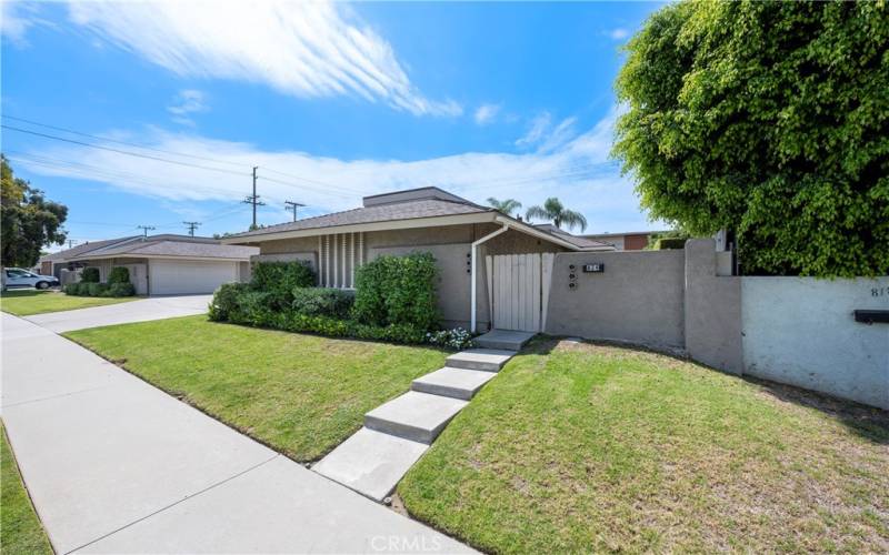 Entry to private backyard, up steps and through gate