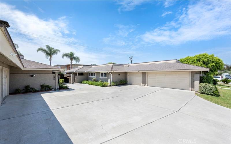 Duplex on right with dual access, one  through single car garage