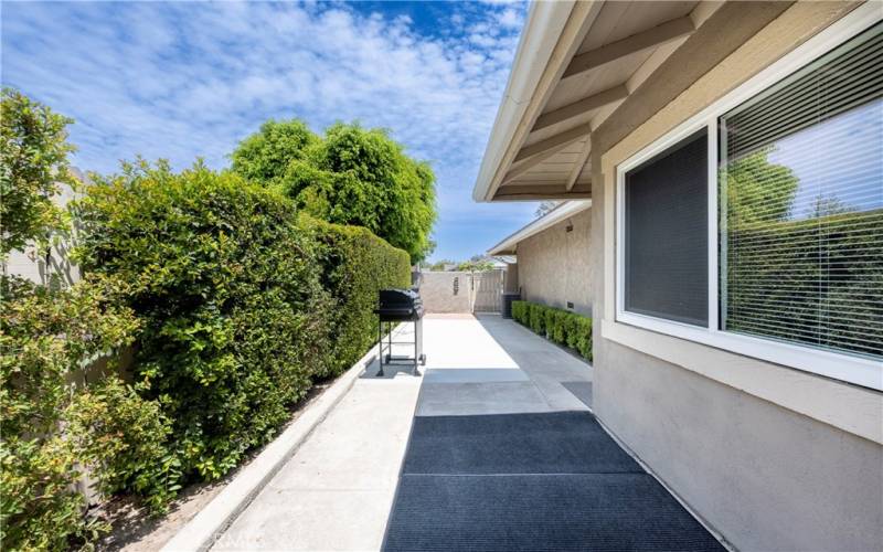 Backyard offering privacy to front door access