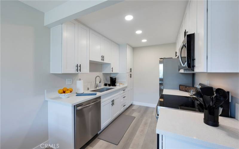 New stainless dishwasher, stainless sink and faucet. Coffee bar with Keurig.