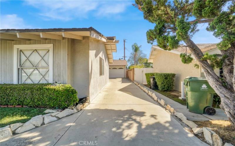 Long driveway leading to garage