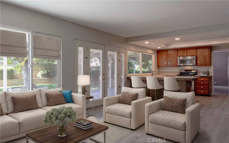 Living room opens to kitchen-Virtually Staged