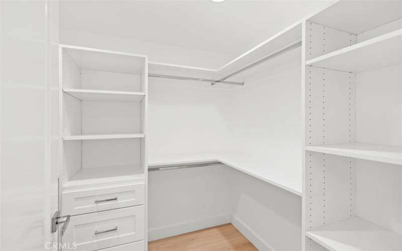 Walk in closet with built in shelving