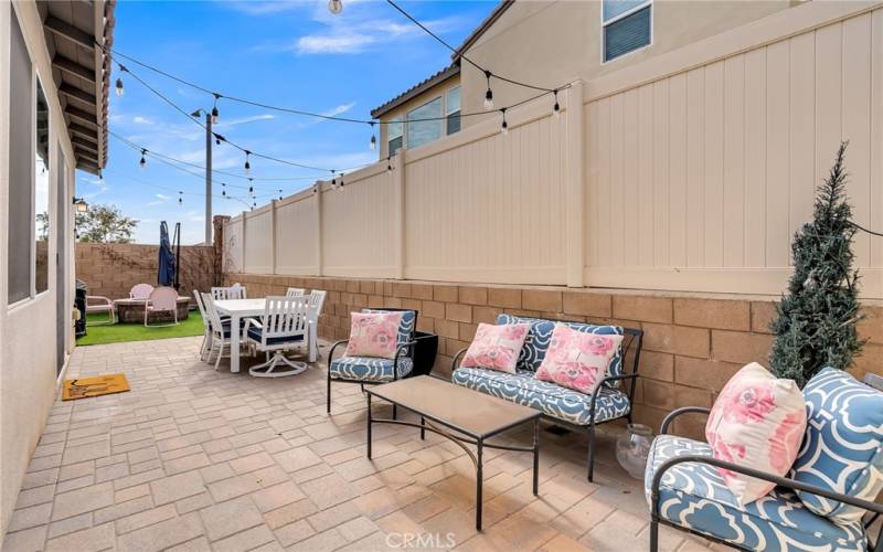 backyard has entertaining and dining space