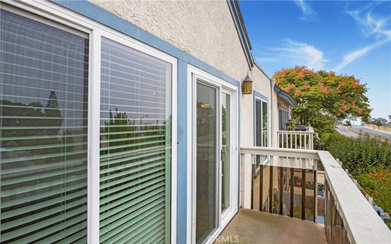 balcony off the living room. Has peek ocean views and really pretty mountain / hill views.