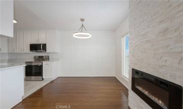 stacked stone fireplace in living room