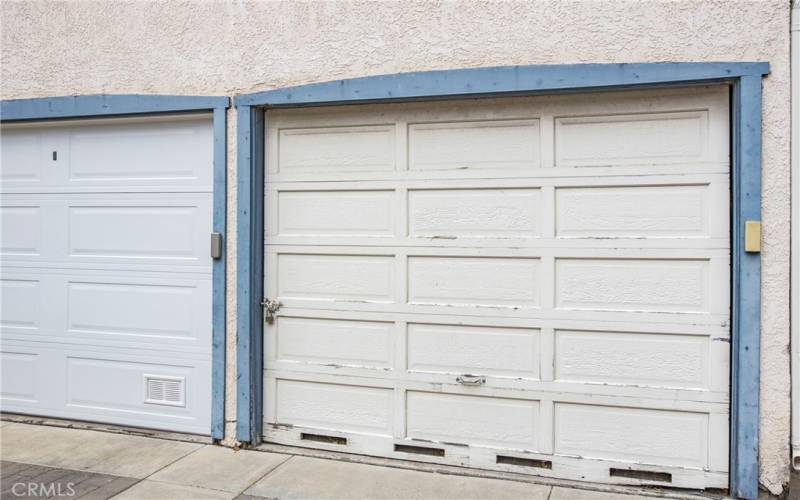 Garage on the right is ours. Garage comfortably fits 1 car plus storage! Unit also has an assigned carport too.