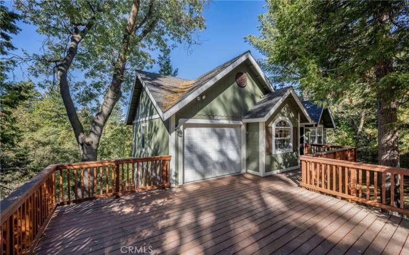 Front entrance with attached garage and zero step to front door.