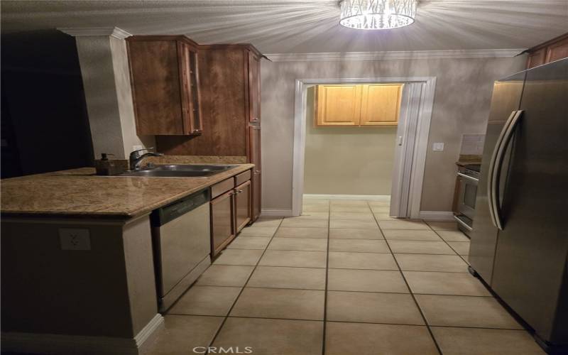 laundry closet at end of kitchen, washer/dryer included