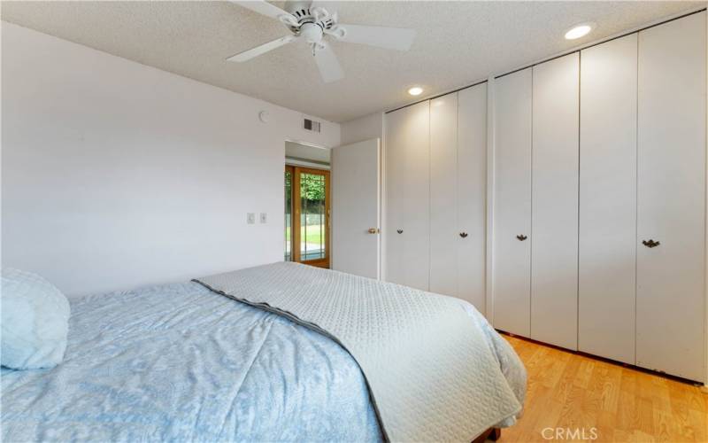 2nd bedroom after the laundry with wall to wall closet space.