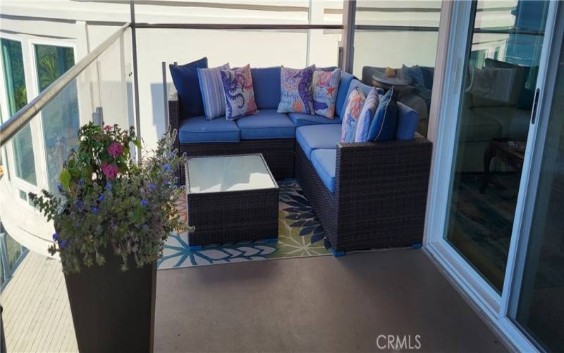 Deck seating off Living Room with ocean view.