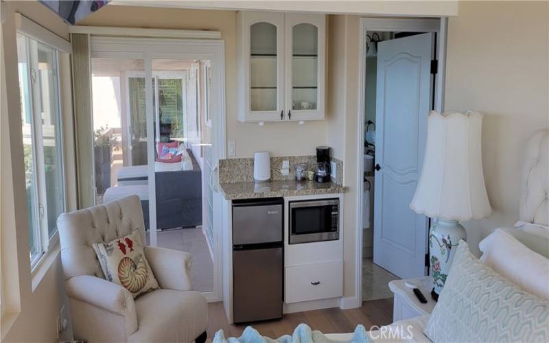 2nd ensuite King bedroom with coffee bar and private ocean view deck seating