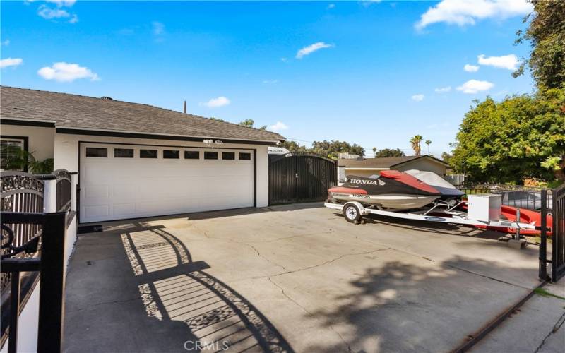 Long driveway with RV or construction side door