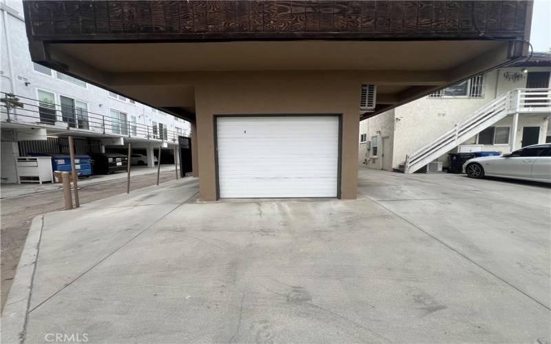 One Covered Parking Space Included to the Right of the Garage