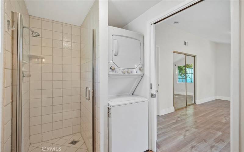 Bathroom also has a GE stackable washer/dryer