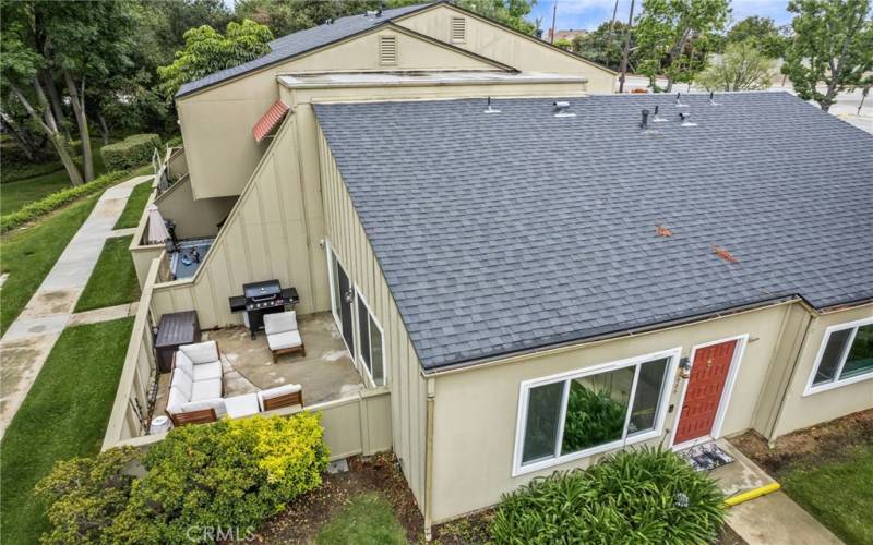 View of home and patio from above