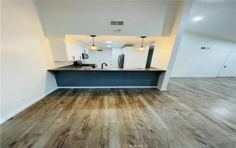 Dining area looking into kitchen