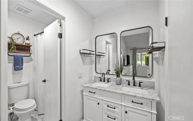 Vanity in between bathroom and master bedroom