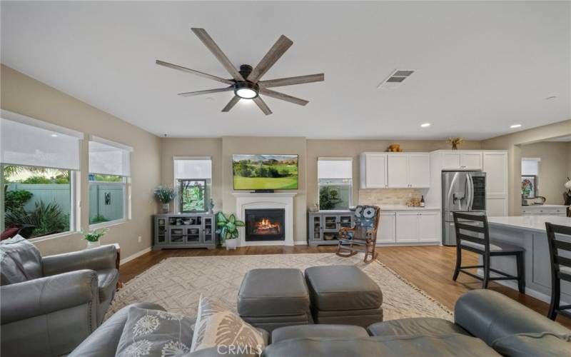 EXPANSIVE LIVING ROOM OPENS TO KITCHEN