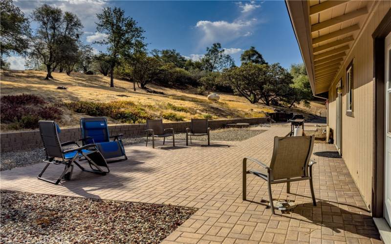 Back patio and BBQ area great for entertaining or enjoying the morning with a cup of coffee!