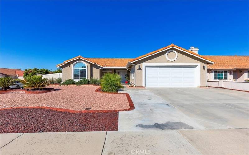 Great curb appeal with low maintenance yard.