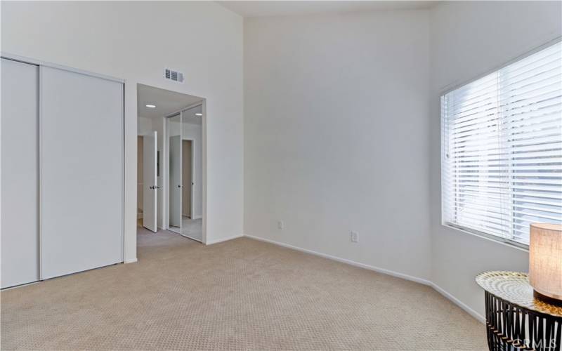 Second portion of Primary 1 Bedroom with two separate closet areas and bathroom en suite.