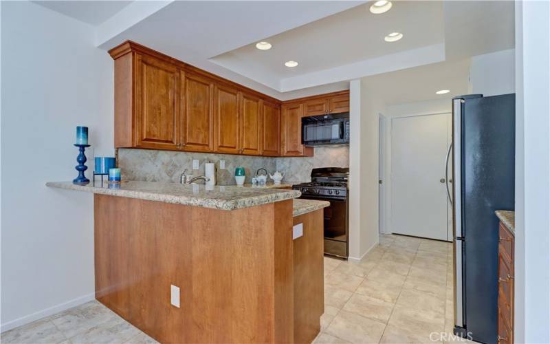 Bar area in dining room with room for bar stools. Kitchen has been upgraded.