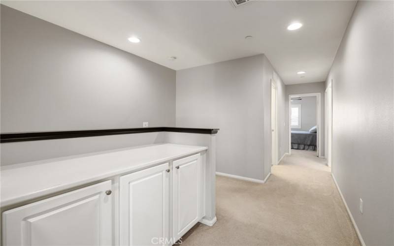 Access to the secondary bedrooms, secondary bathroom and laundry room