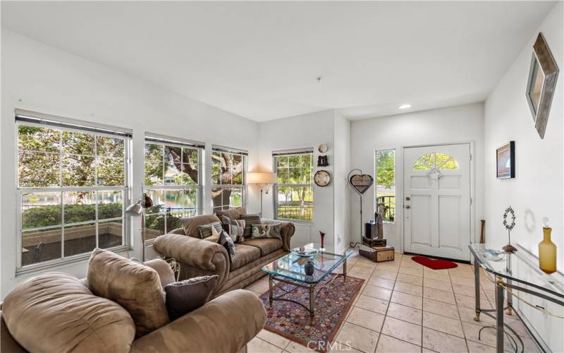 Living room with lake views from all windows.